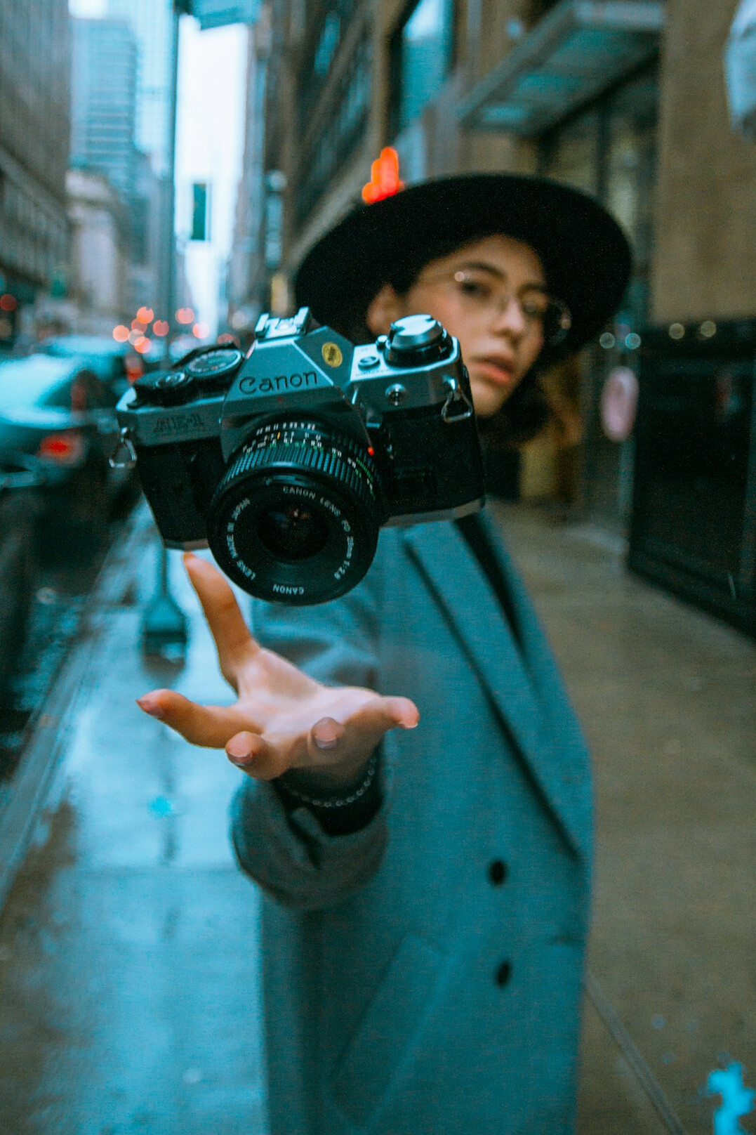 filmmaker holding camera outdoors