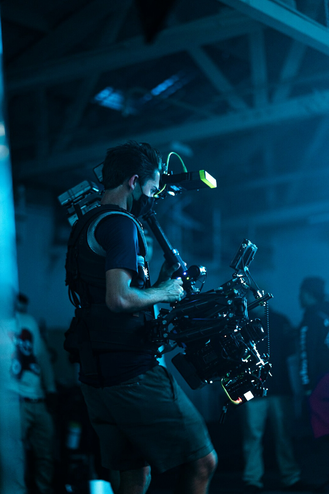 cinematographer adjusting lights